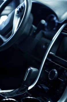 Vehicle Dash - Car Central Console with Automatic Transmission Stick. Vertical Photo. Car Interiors Photo Collection.