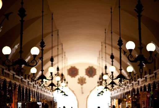 Retro Lighting - European Architecture. The Renaissance Sukiennice ( Cloth Hall, Drapers\' Hall ) in Kraków, Poland. Horizontal Photography