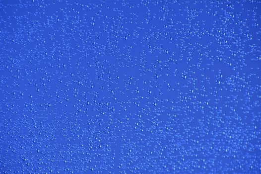 Water Drops - Blue Glass with Small Water Drops. Background