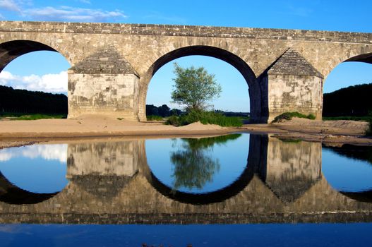 Vintage Stones Bridge. Old French Stone Bridge. France, Europe.