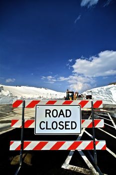 Closed Road - Road Closed - Road Maintenance Sign. Colorado U.S.A. Vertical Photo.