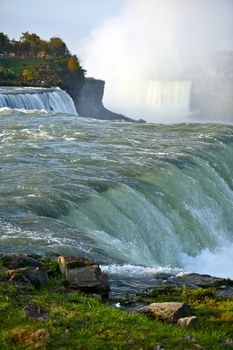 American Falls - Niagara. Taken from American Side. Niagara Falls, USA, NIagara Falls, Ontario, Canada. United States and Canada Border. Vertical Photo