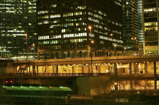 Big American City at Night. Chicago, Illinois. Multilevel Streets and Skyscrapers. Urban Theme.