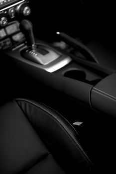 Leather Seats - Dark Vehicle Interior Design. Vertical Studio Photo.