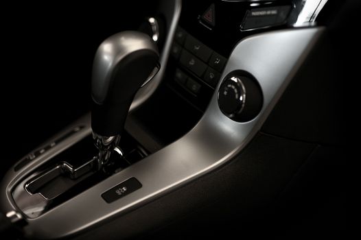 Automatic Transmission Stick and Elegant Car Interior with Silver Elements. Horizontal Studio Photo.