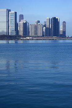 Lake Michigan and Chicago Part of the Skyline. Calm Lake Michigan Water. Vertical Photography.