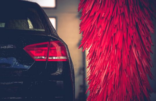 Brush Car Wash Car Cleaning. Red Car Wash Brushes Ready to Use.