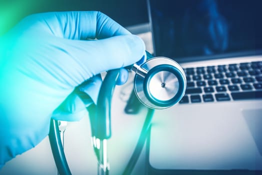 Physician Stethoscope and His Laptop Computer. Medical Clinic Room Equipment.