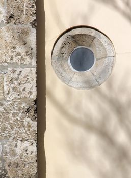 Circular church window stone wall background.