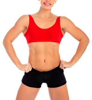 Fitness woman posing against a white background, isolated