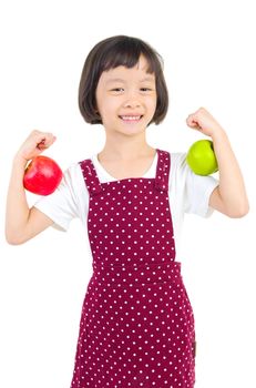 Asian girl holding red and green apple (acting strong)