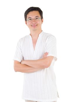 Confident Asian man crossed arms over white background