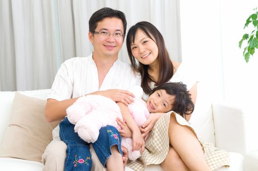 Indoor portrait of asian family