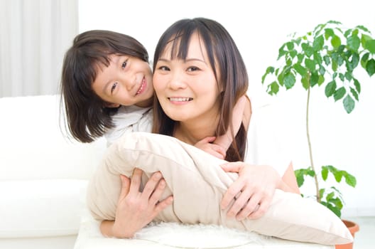 Indoor portrait of asian family