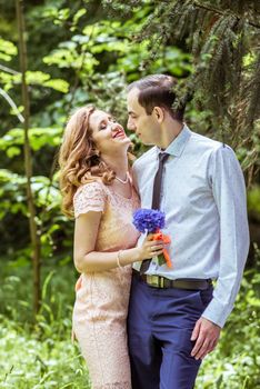 Close up portrait of couple. Smiling man and woman embracing in Lviv, Ukraine.