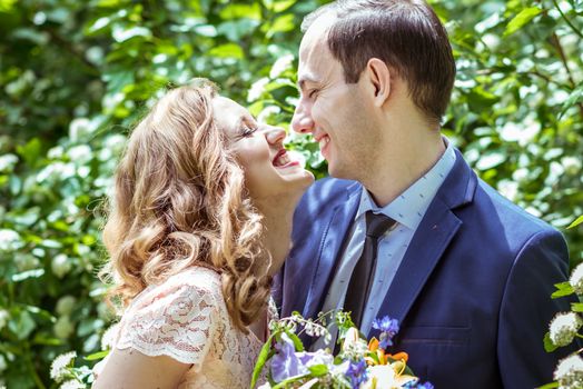 Close up portrait of couple. Smiling man and woman embracing in Lviv, Ukraine.