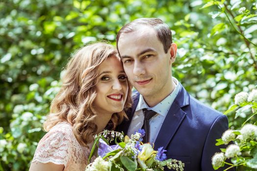 Close up portrait of couple. Smiling man and woman embracing in Lviv, Ukraine.