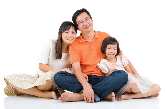 Indoor portrait of beautiful asian family