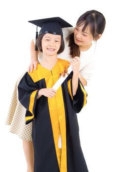 Asian daughter in graduation gown.Taking photo with her mother.