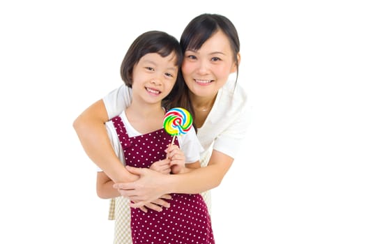 Indoor portrait of beautiful asian woman and her daughter