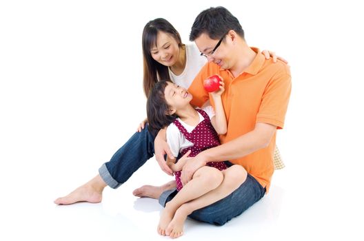 Asian family having fun at home