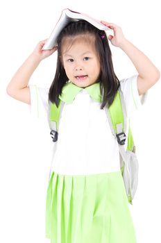 Happy little schoolgirl with books isolated on white background