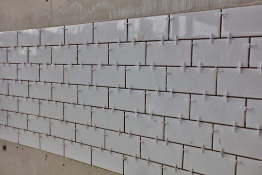 Tile lying