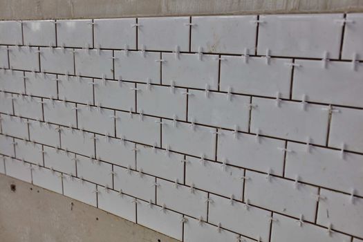Tile lying