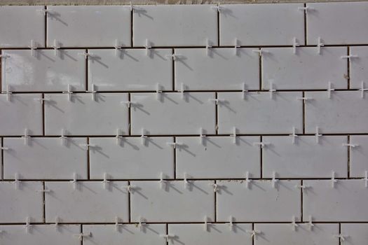 Tile lying