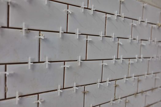 Tile lying