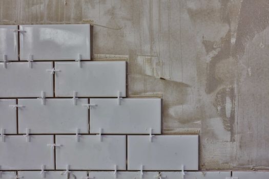 Tile lying