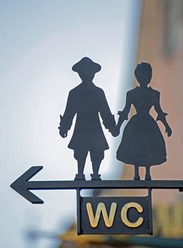 Sign WC with stylized man and woman