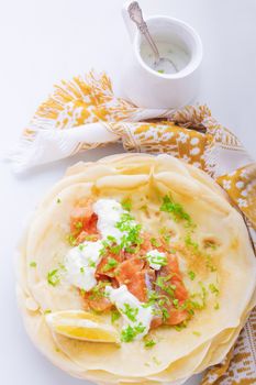 Crispy crepes with smoked salmon  and  cream cheese.