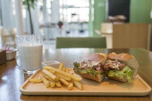 Ham and Cheese Sandwich with French Fries and Milk