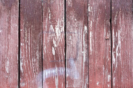 grungy texture of the old boards with shabby brown cherry paint