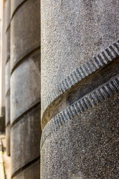 Gallery thick concrete columns with a spiral pattern