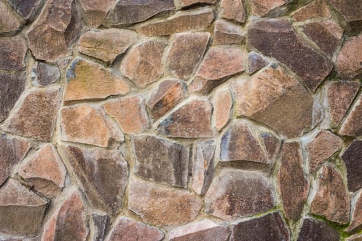 wall of large crushed colored stone 