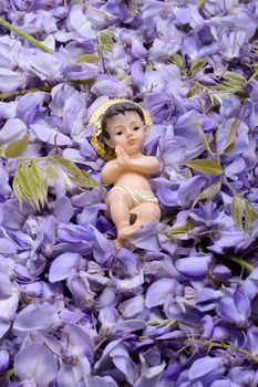 Jesus on a lawn wisteria flowers easter