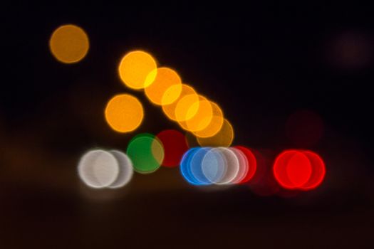 abstract blur of night lights formed a triangle