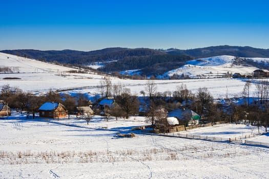 winter landscape view of the village in the mountains