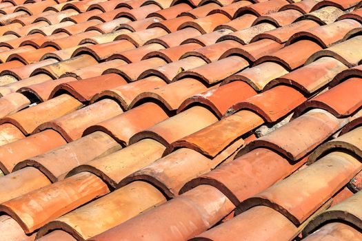 texture rows of round red tiles on the roof