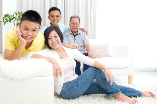 Indoor portrait of beautiful asian 3 generations family