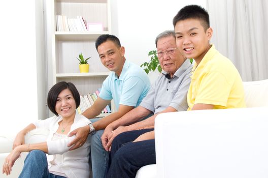 Indoor portrait of beautiful asian 3 generations family