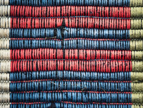 abstract background detail red blue carpet weaving