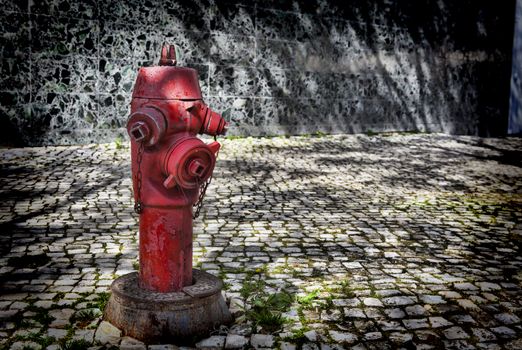 Red fire hydrant in  Lisbon Portugal