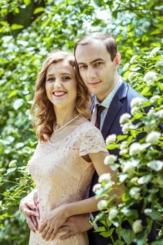 Close up portrait of couple. Smiling man and woman embracing in Lviv, Ukraine.