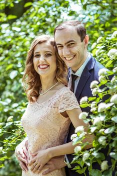 Close up portrait of couple. Smiling man and woman embracing in Lviv, Ukraine.