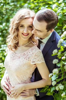 Close up portrait of couple. Smiling man and woman embracing in Lviv, Ukraine.