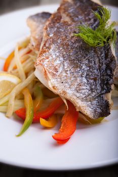 Fillet of sea bream with fennel and pepper.