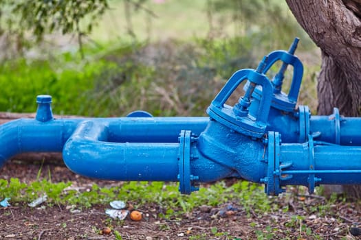 big metal pipe with nature background 